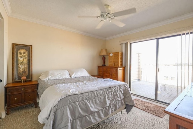 carpeted bedroom featuring ceiling fan, ornamental molding, and access to outside