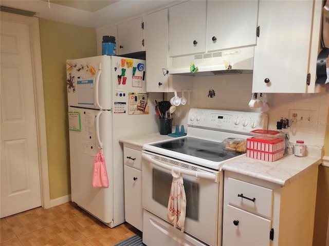 kitchen with white cabinets, decorative backsplash, and white appliances