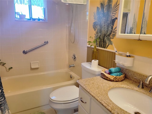 full bathroom featuring vanity, toilet, and shower / tub combo