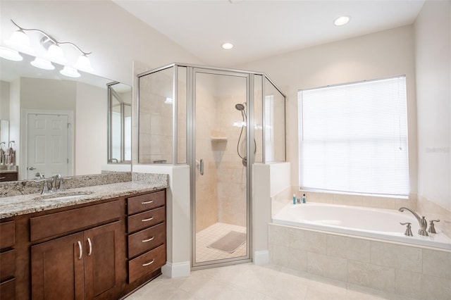 full bathroom featuring a garden tub, recessed lighting, a stall shower, vanity, and tile patterned floors