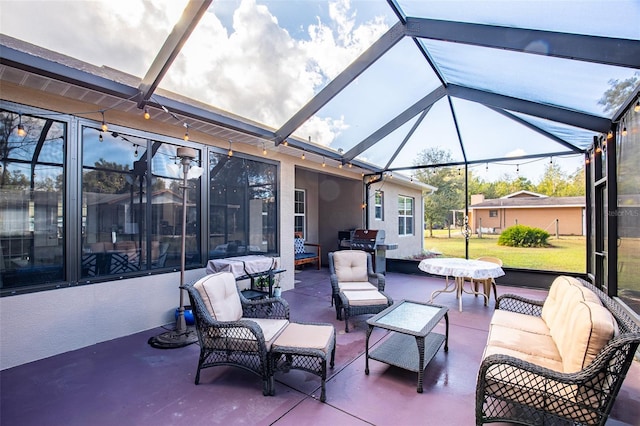 view of patio / terrace with outdoor lounge area and a lanai