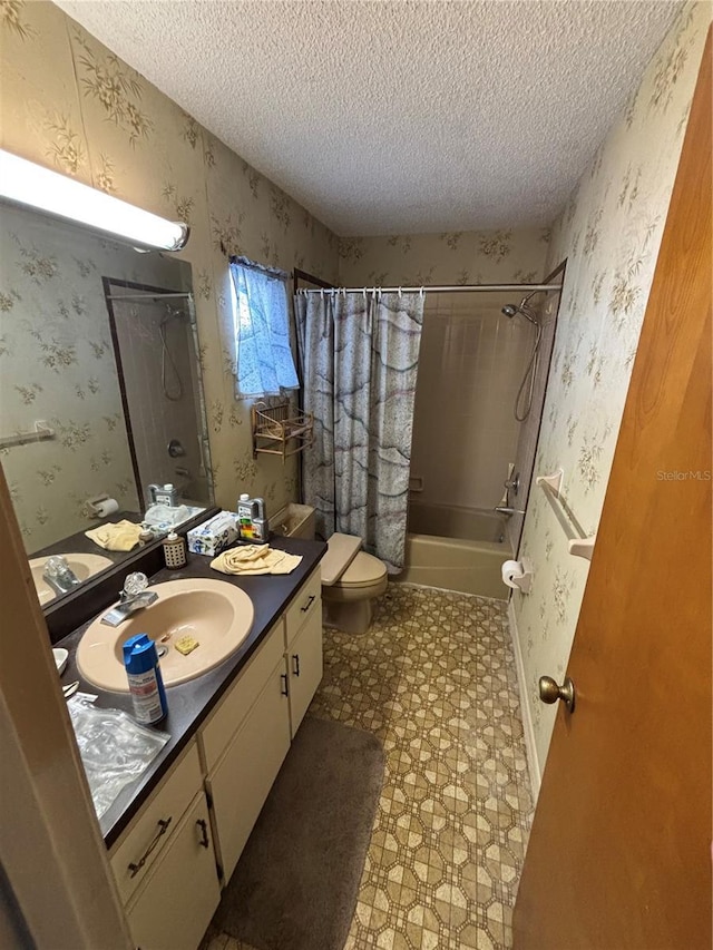 full bath featuring wallpapered walls, toilet, a textured ceiling, vanity, and tile patterned floors