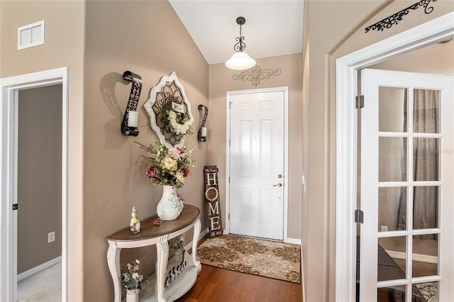 entrance foyer featuring hardwood / wood-style flooring