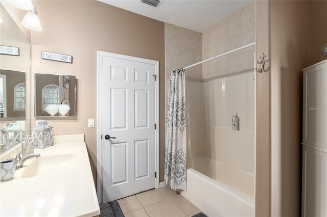 bathroom featuring tile patterned floors, vanity, and shower / bath combination with curtain