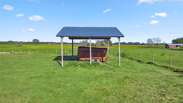 view of yard featuring a gazebo and a rural view