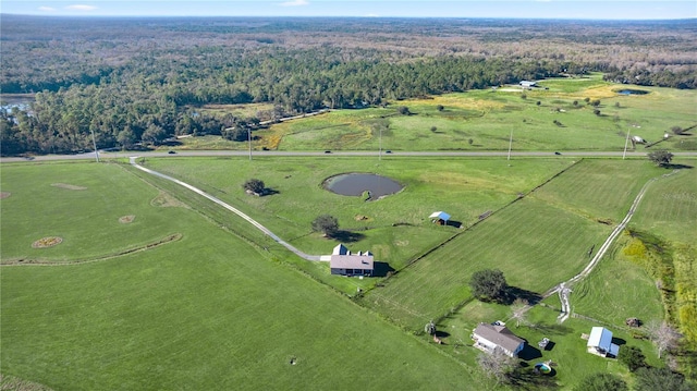 birds eye view of property featuring a rural view