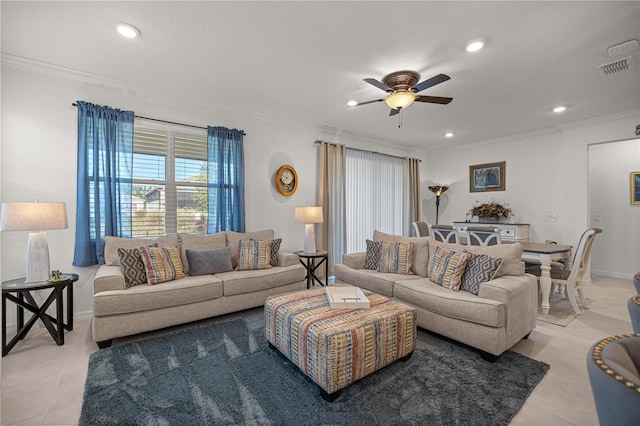 tiled living room featuring ceiling fan and ornamental molding