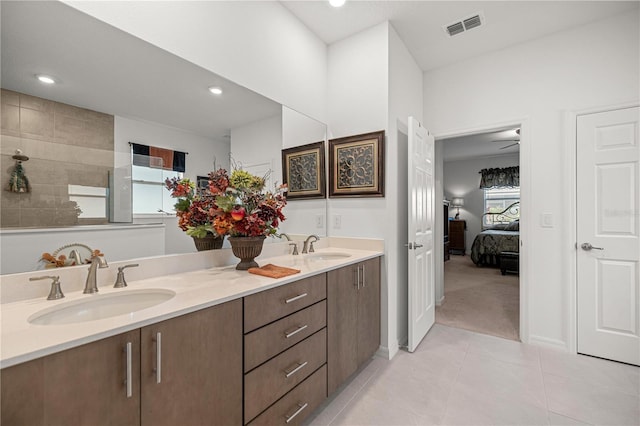 bathroom featuring tile patterned floors and vanity