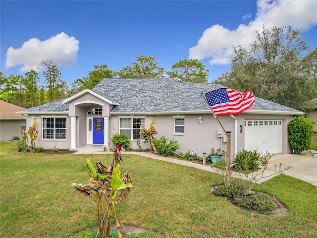 ranch-style house featuring a garage and a front lawn