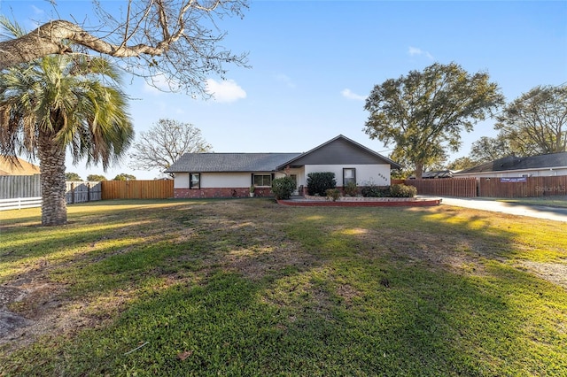 view of front of house with a front lawn