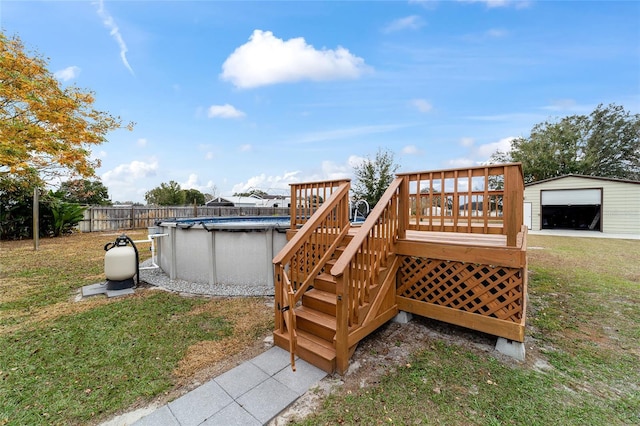 wooden terrace featuring a yard