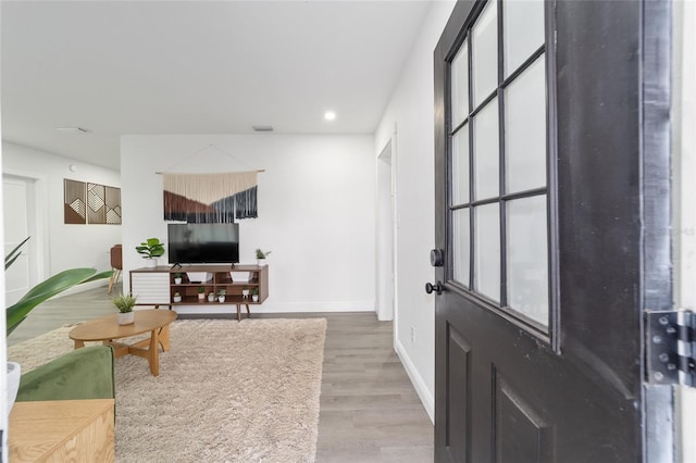 foyer featuring hardwood / wood-style flooring