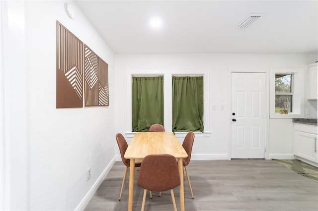 dining space featuring light hardwood / wood-style floors