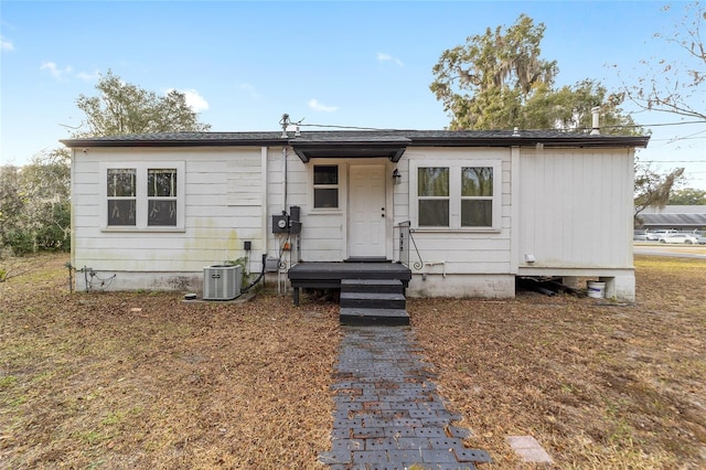 view of front of home featuring cooling unit