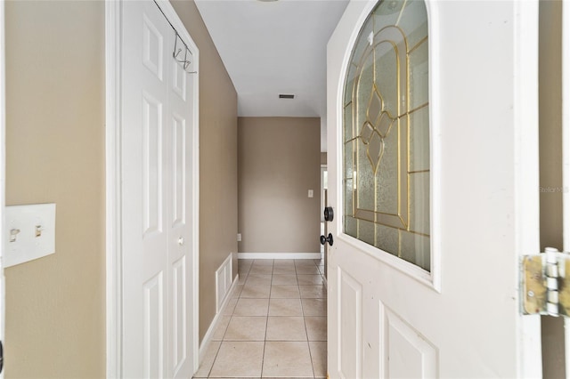 interior space featuring light tile patterned floors