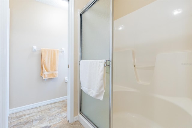 bathroom featuring walk in shower