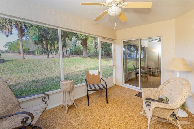 sunroom / solarium with ceiling fan