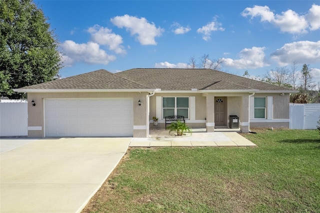 ranch-style house with a front yard and a garage