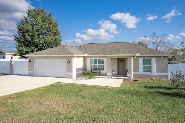 ranch-style home with a front yard and a garage