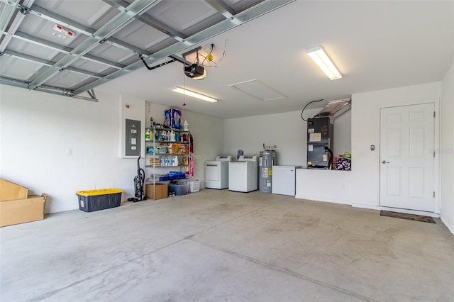 garage featuring electric water heater, electric panel, a garage door opener, washing machine and dryer, and heating unit