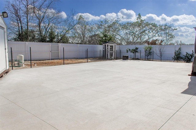 view of patio with a storage unit