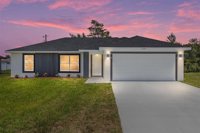4393 SW 169 Lane Rd, Ocala, FL 34473 - single story home featuring a shingled roof, concrete driveway, an attached garage, and a front yard