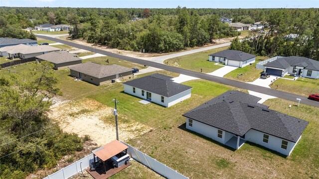 4393 SW 169 Lane Rd, Ocala, FL 34473 - aerial view of residential area featuring a heavily wooded area