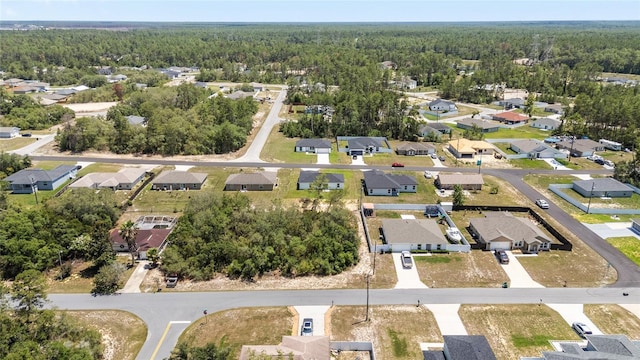 4393 SW 169 Lane Rd, Ocala, FL 34473 - aerial perspective of suburban area featuring a forest