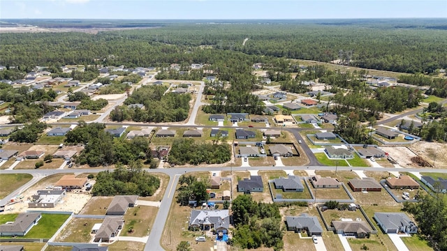 4393 SW 169 Lane Rd, Ocala, FL 34473 - aerial view of property's location featuring a forest and nearby suburban area