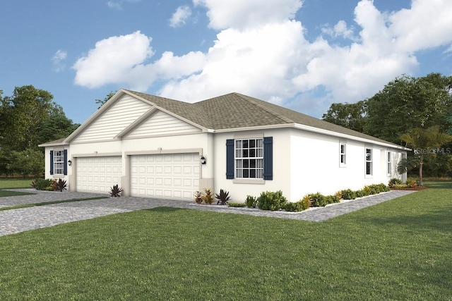 view of front of property featuring a front yard and a garage