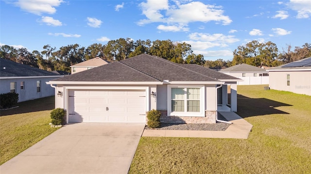 single story home featuring a garage and a front yard