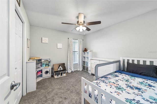 bedroom with ceiling fan, a closet, and carpet flooring