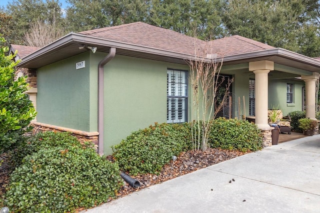 view of home's exterior featuring covered porch