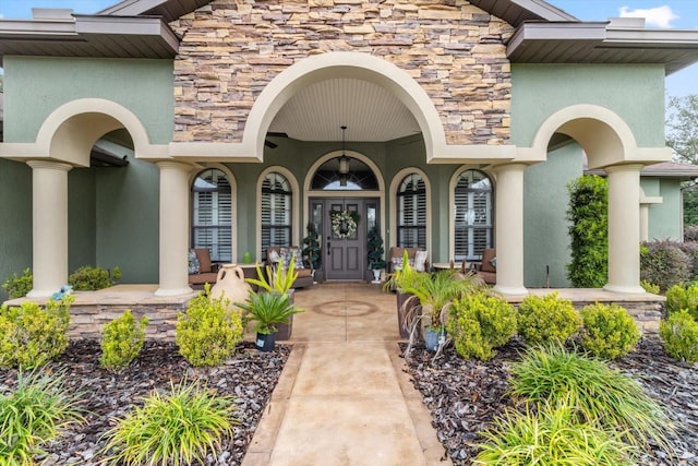 entrance to property featuring a porch