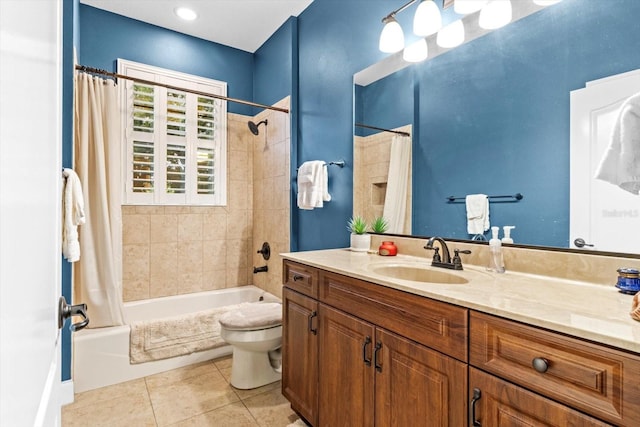 full bathroom featuring toilet, shower / tub combo, vanity, and tile patterned floors