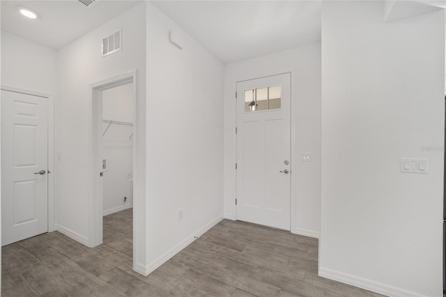 foyer with light hardwood / wood-style flooring