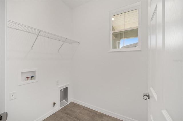 laundry area featuring washer hookup, hookup for an electric dryer, and hardwood / wood-style flooring