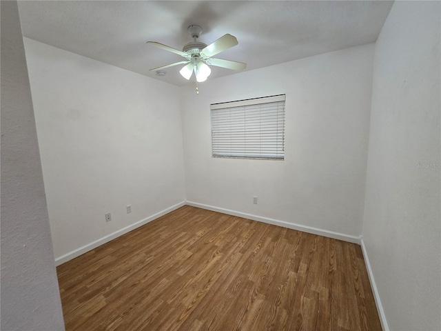 unfurnished room featuring ceiling fan and hardwood / wood-style floors