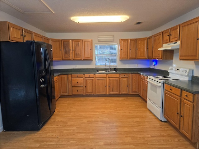 kitchen with electric range, light hardwood / wood-style floors, sink, and black refrigerator with ice dispenser