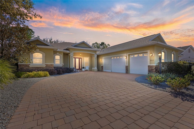 view of front of home with a garage