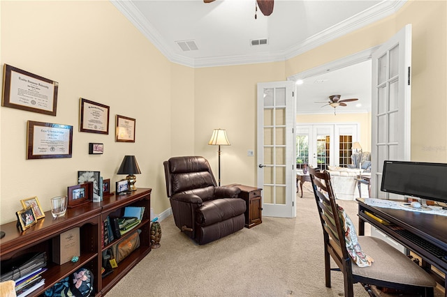 office space with light colored carpet, crown molding, and french doors