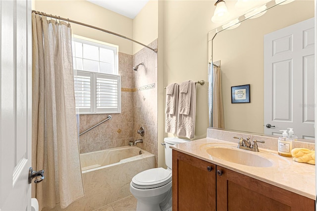 full bathroom featuring tile patterned flooring, vanity, shower / tub combo with curtain, and toilet