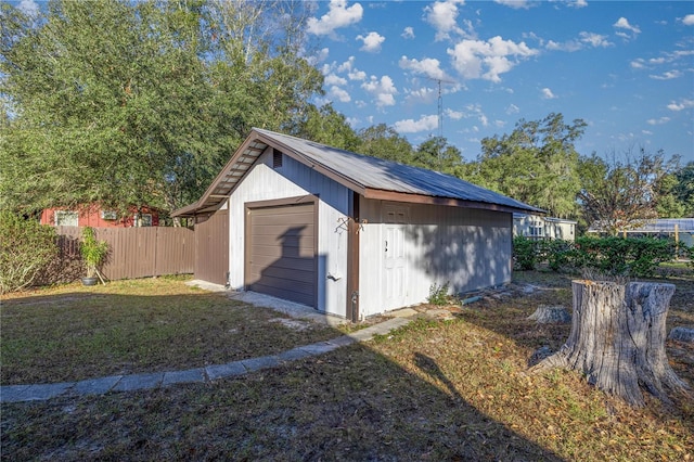 garage with a yard