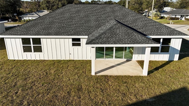 exterior space with a patio and a yard