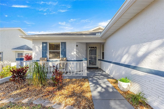 property entrance with a porch