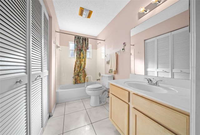 full bathroom featuring vanity, tile patterned flooring, toilet, shower / bathtub combination with curtain, and a textured ceiling