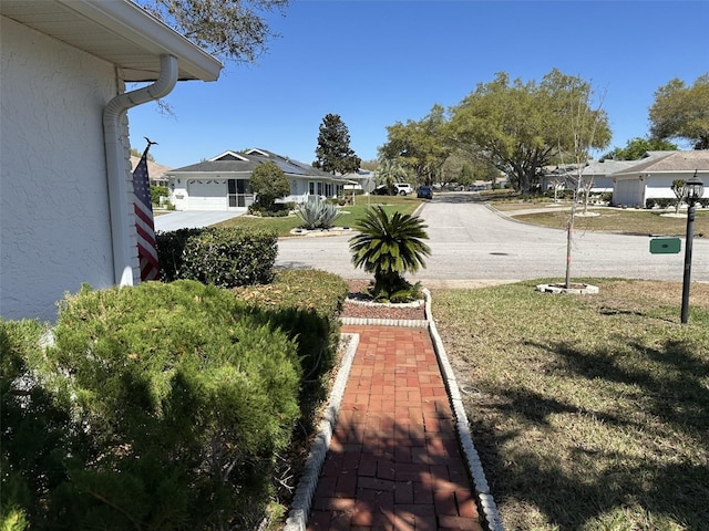 view of yard featuring a residential view