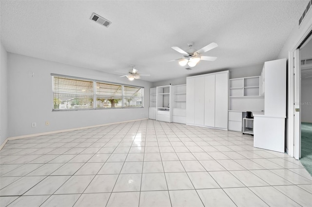 9260 SW 92nd Place Rd, Ocala, FL 34481 - unfurnished living room with light tile patterned floors, visible vents, a textured ceiling, and ceiling fan