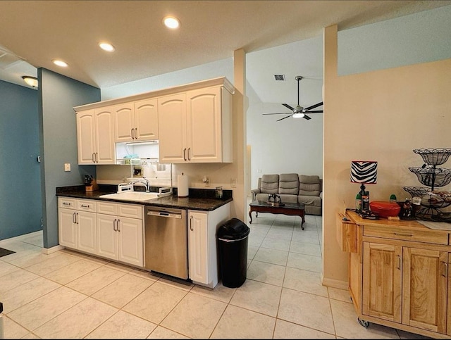 kitchen with ceiling fan, light tile patterned floors, sink, and stainless steel dishwasher