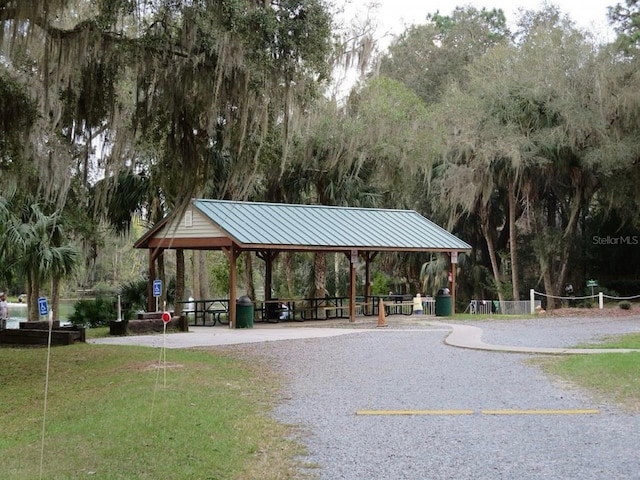 view of property's community with volleyball court and a gazebo